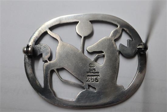 A Danish Georg Jensen sterling kneeling deer oval brooch, no. 256, 43mm.